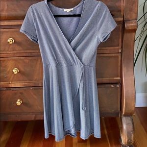 Blue and white striped, flattering faux wrap dress